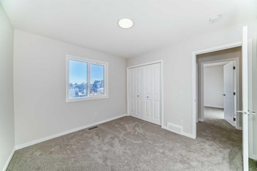 40 Ellen Lane, Crossfield, AB - Indoor Photo Showing Other Room
