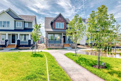 40 Ellen Lane, Crossfield, AB - Outdoor With Deck Patio Veranda With Facade