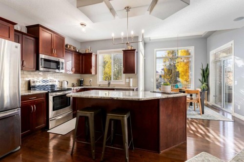 27 Tuscany Estates Drive Nw, Calgary, AB - Indoor Photo Showing Kitchen With Stainless Steel Kitchen With Upgraded Kitchen