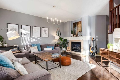 27 Tuscany Estates Drive Nw, Calgary, AB - Indoor Photo Showing Living Room With Fireplace