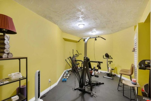 79 Harrison Green, Olds, AB - Indoor Photo Showing Gym Room