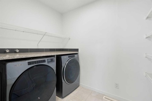 248 Masters Row Se, Calgary, AB - Indoor Photo Showing Laundry Room