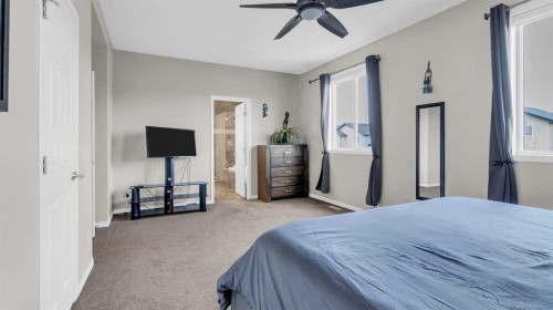 1120 Windhaven Close Sw, Airdrie, AB - Indoor Photo Showing Bedroom