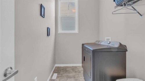 1120 Windhaven Close Sw, Airdrie, AB - Indoor Photo Showing Laundry Room