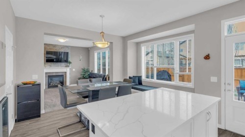 1120 Windhaven Close Sw, Airdrie, AB - Indoor With Fireplace