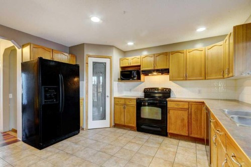 5 Inverness Court Se, Calgary, AB - Indoor Photo Showing Kitchen With Double Sink