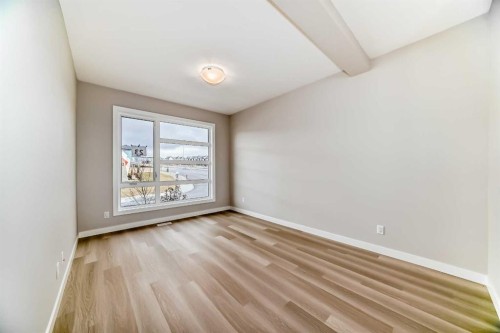 23 Lucas Way Nw, Calgary, AB - Indoor Photo Showing Other Room