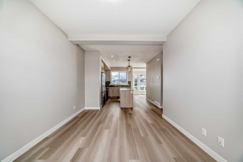 23 Lucas Way Nw, Calgary, AB - Indoor Photo Showing Other Room