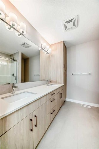 23 Lucas Way Nw, Calgary, AB - Indoor Photo Showing Bathroom