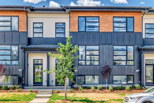 23 Lucas Way Nw, Calgary, AB - Outdoor With Facade