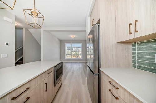 23 Lucas Way Nw, Calgary, AB - Indoor Photo Showing Kitchen
