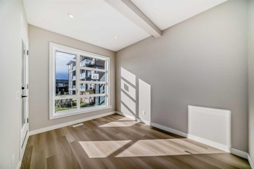 23 Lucas Way Nw, Calgary, AB - Indoor Photo Showing Other Room