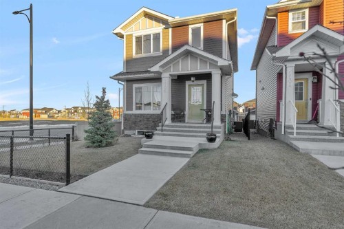 1100 Bayview Gardens Sw, Airdrie, AB - Outdoor With Facade