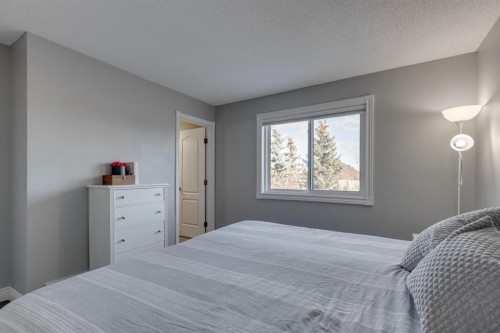 22 Hidden Spring Court Nw, Calgary, AB - Indoor Photo Showing Bedroom