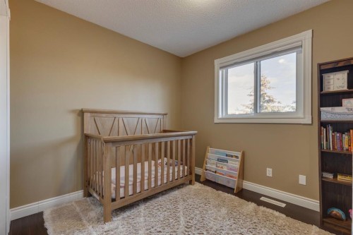 22 Hidden Spring Court Nw, Calgary, AB - Indoor Photo Showing Bedroom