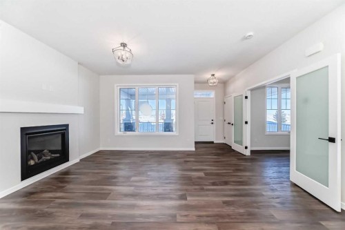 44 Ellen Lane, Crossfield, AB - Indoor With Fireplace