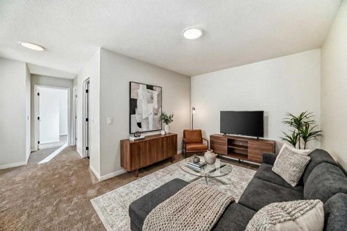 44 Ellen Lane, Crossfield, AB - Indoor Photo Showing Living Room