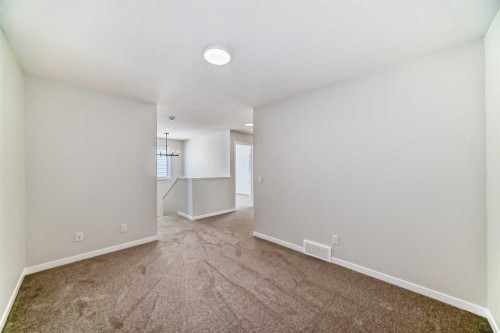 44 Ellen Lane, Crossfield, AB - Indoor Photo Showing Other Room