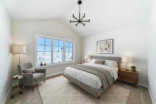 44 Ellen Lane, Crossfield, AB - Indoor Photo Showing Bedroom