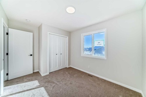 44 Ellen Lane, Crossfield, AB - Indoor Photo Showing Other Room