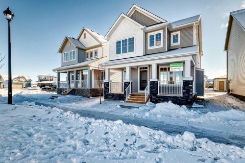 44 Ellen Lane, Crossfield, AB - Outdoor With Deck Patio Veranda With Facade