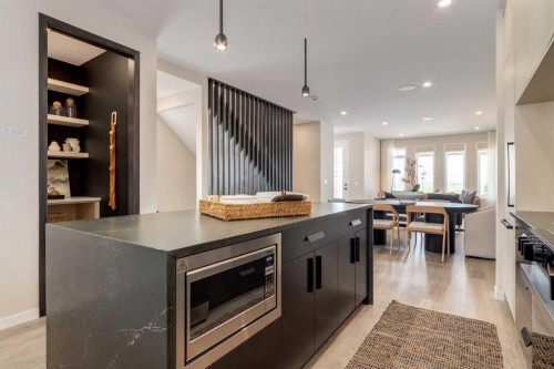 75 Bluerock Terrace Sw, Calgary, AB - Indoor Photo Showing Kitchen With Upgraded Kitchen