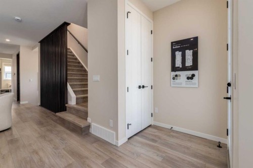 75 Bluerock Terrace Sw, Calgary, AB - Indoor Photo Showing Other Room