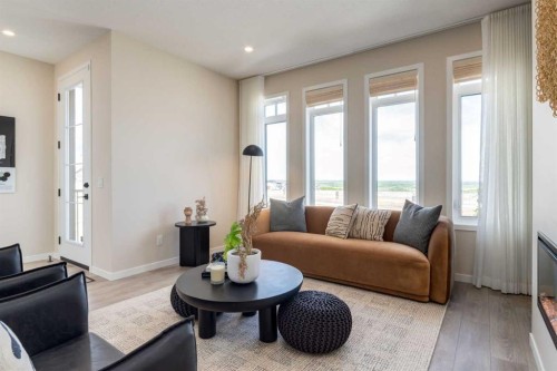 75 Bluerock Terrace Sw, Calgary, AB - Indoor Photo Showing Living Room