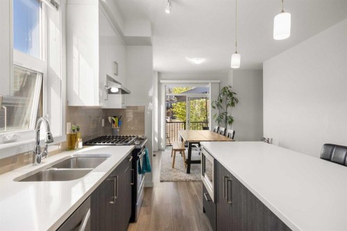 104 Sherwood Lane Nw, Calgary, AB - Indoor Photo Showing Kitchen With Double Sink With Upgraded Kitchen