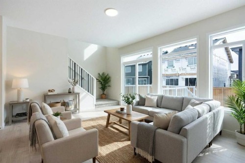 53 Creekside Passage Sw, Calgary, AB - Indoor Photo Showing Living Room