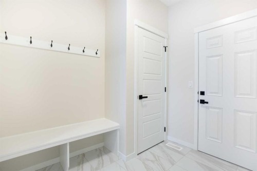 53 Creekside Passage Sw, Calgary, AB - Indoor Photo Showing Other Room