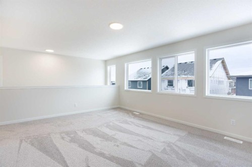 53 Creekside Passage Sw, Calgary, AB - Indoor Photo Showing Other Room