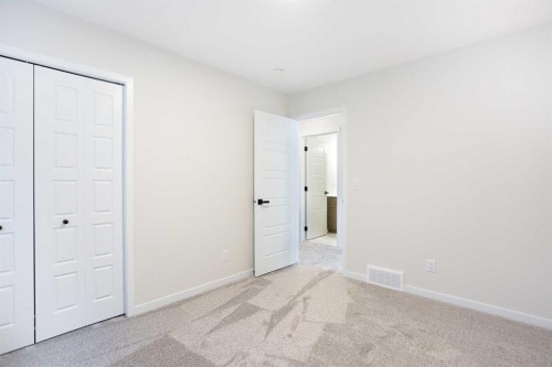 53 Creekside Passage Sw, Calgary, AB - Indoor Photo Showing Other Room