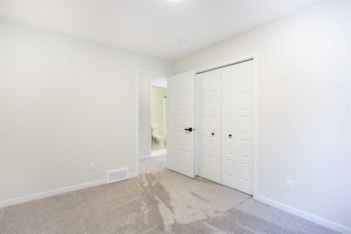 53 Creekside Passage Sw, Calgary, AB - Indoor Photo Showing Other Room
