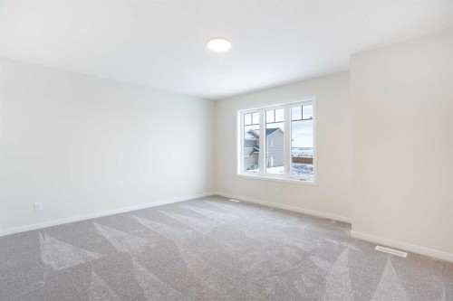 53 Creekside Passage Sw, Calgary, AB - Indoor Photo Showing Other Room