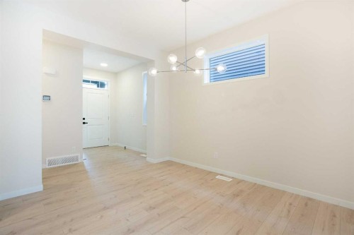 53 Creekside Passage Sw, Calgary, AB - Indoor Photo Showing Other Room