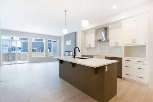 53 Creekside Passage Sw, Calgary, AB - Indoor Photo Showing Kitchen With Upgraded Kitchen