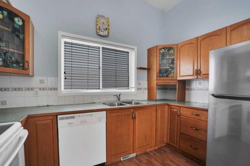 193 Martindale Drive Ne, Calgary, AB - Indoor Photo Showing Kitchen With Double Sink