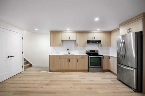1040 Lake Ontario Drive Se, Calgary, AB - Indoor Photo Showing Kitchen With Stainless Steel Kitchen