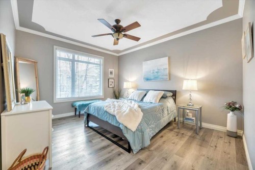 64 Discovery Woods Villas Sw, Calgary, AB - Indoor Photo Showing Bedroom