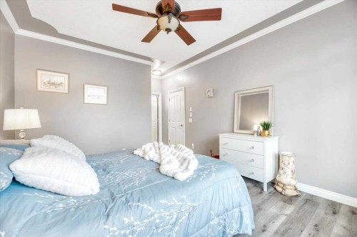 64 Discovery Woods Villas Sw, Calgary, AB - Indoor Photo Showing Bedroom