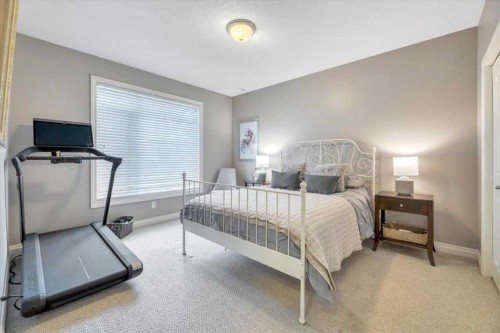64 Discovery Woods Villas Sw, Calgary, AB - Indoor Photo Showing Bedroom