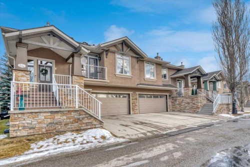 64 Discovery Woods Villas Sw, Calgary, AB - Outdoor With Facade