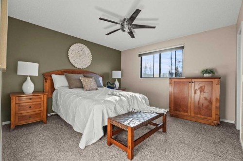 15 Beacham Rise Nw, Calgary, AB - Indoor Photo Showing Bedroom