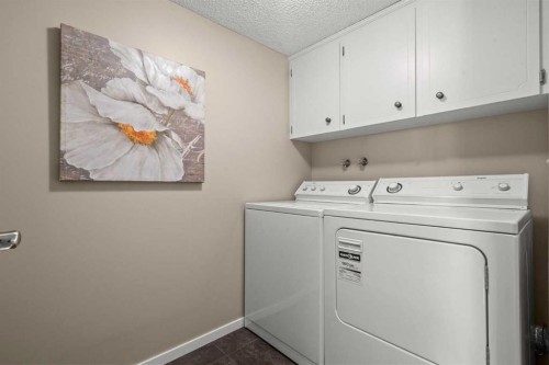 15 Beacham Rise Nw, Calgary, AB - Indoor Photo Showing Laundry Room