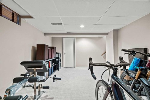 15 Beacham Rise Nw, Calgary, AB - Indoor Photo Showing Gym Room