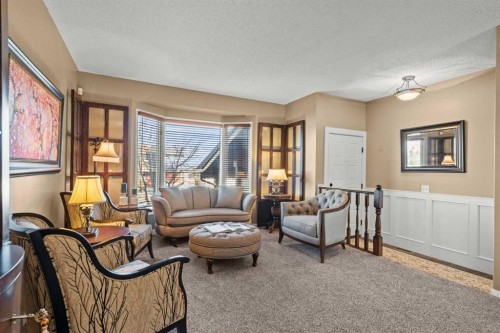 15 Beacham Rise Nw, Calgary, AB - Indoor Photo Showing Living Room