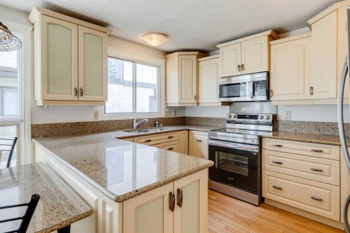 203 Edgeland Road Nw, Calgary, AB - Indoor Photo Showing Kitchen
