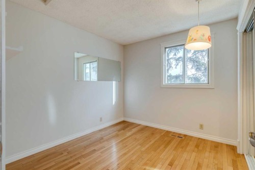 203 Edgeland Road Nw, Calgary, AB - Indoor Photo Showing Other Room