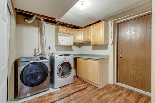 203 Edgeland Road Nw, Calgary, AB - Indoor Photo Showing Laundry Room